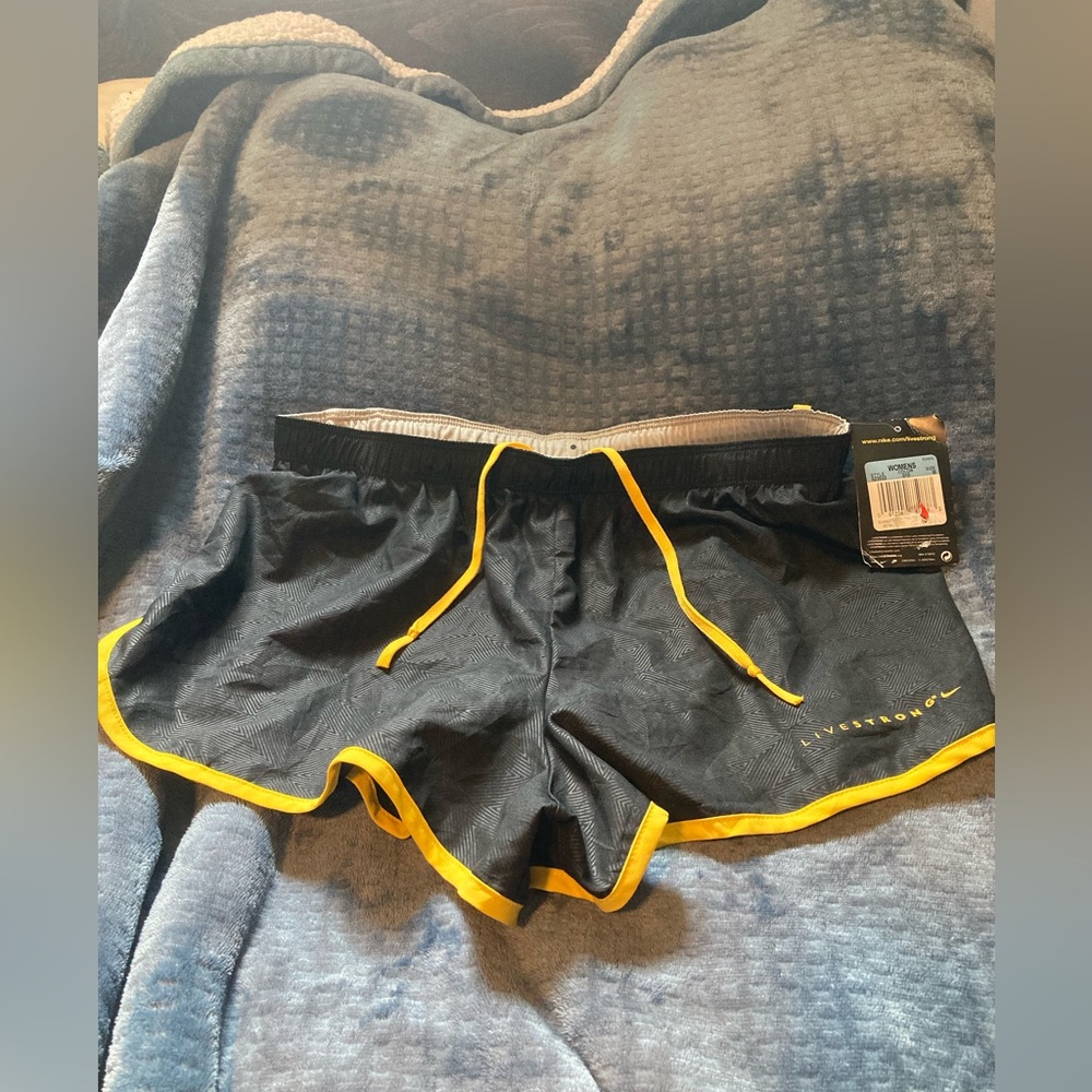Nike, Livestrong, medium, nwt but has some marks inside, dri-fit shorts